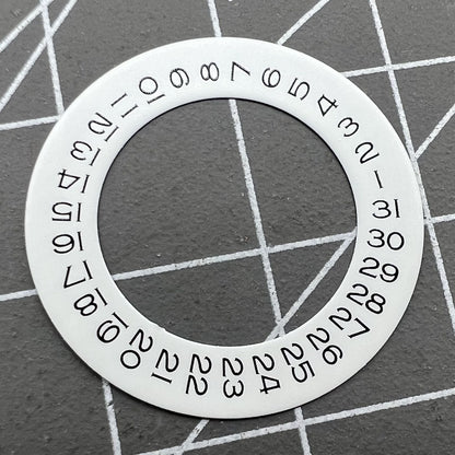 Wide brim white date wheel overlay for ETA 2836 movement with date display at 3 o'clock.