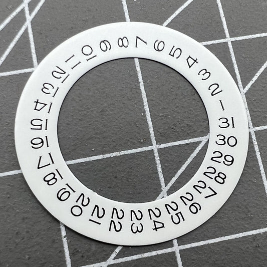 Wide brim white date wheel overlay for ETA 2836 movement with date display at 3 o'clock.