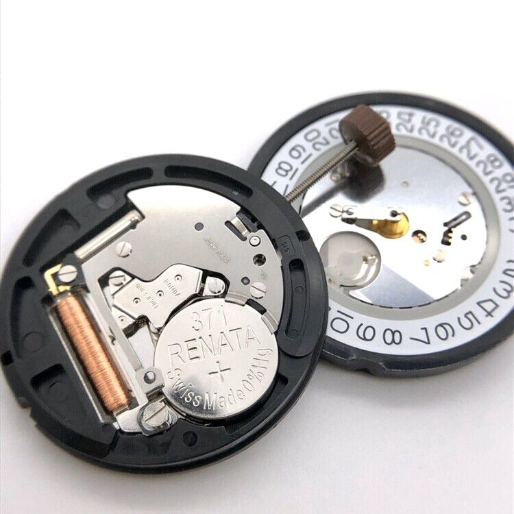 Ronda 515 quartz watch movement with date display at 3 o?clock, precise timekeeping component.