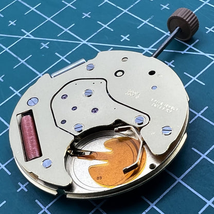 Swiss Made Ronda 6004D quartz watch movement with date at 3 o'clock, perfect for precise repairs.