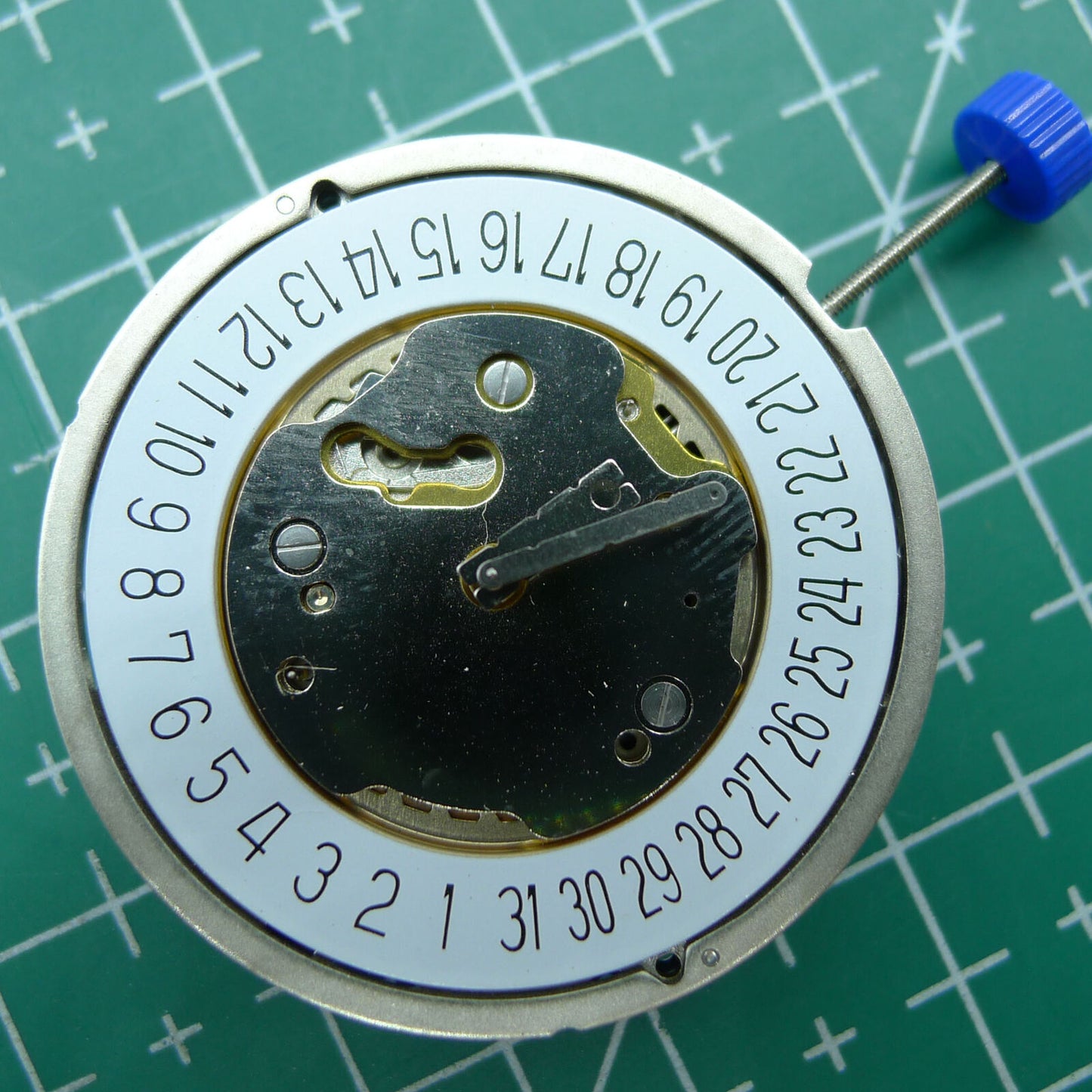 Ronda 5021D Swiss quartz watch movement with date display at 6, ideal for watch accessories.