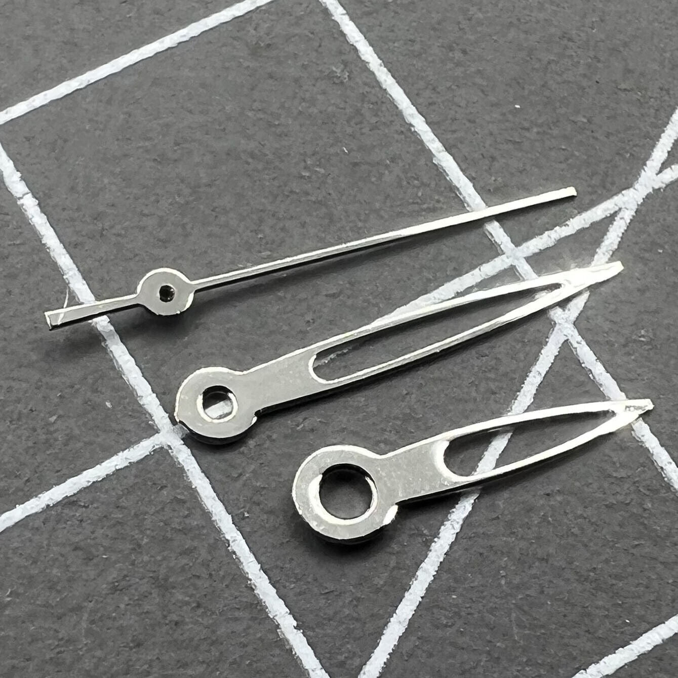 Hollow arrow-shaped watch hands for Miyota 2035, precise design by P1-H3-C25 enhancing quartz watch style.