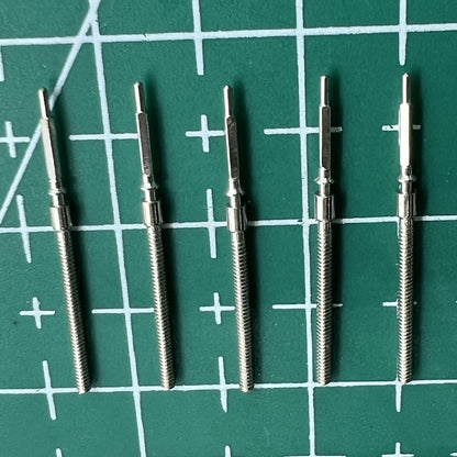 Wholesale lot of durable watch winding stems for 6309 movement, ideal spare parts for Seiko watch repairs.