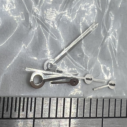 9.5mm silver arrow-shaped watch hand with trim for Epson VX3J VX9J VX7J VX3N VX9N VX42 models, precise fit.