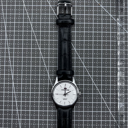 Beijing 31mm mechanical watch featuring silver case, black double rhomb strap, and classic three-hand design.