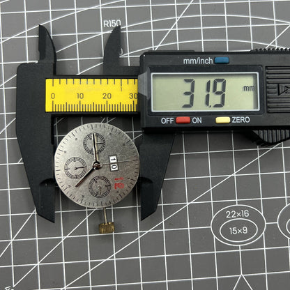 7750 mechanical watch movement showcasing big date at 12 and small seconds at 3, Swiss craftsmanship.