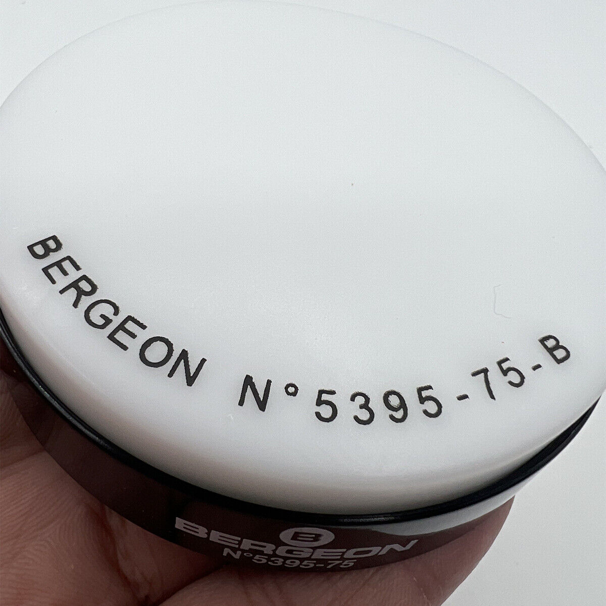 Bergeon 5395-75-B white gel cushion, 75mm, secures watches during repair and assembly processes.