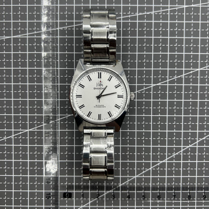 Shanghai 38mm manual mechanical watch with white dial, three hands, and stainless steel case by Shanghai brand.