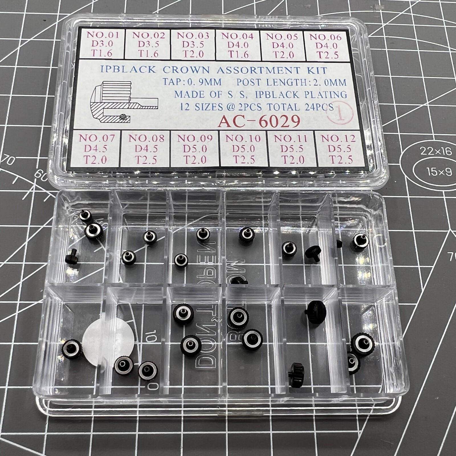 Black plated stainless steel watch crowns, 24 pieces in 12 sizes, perfect for watch repairs and customization.