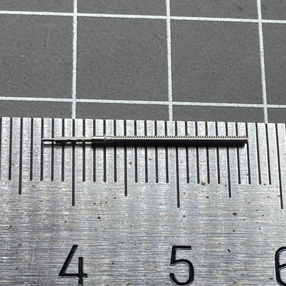 Watch winding stem VX12E, spare part for precise watch repair and maintenance.