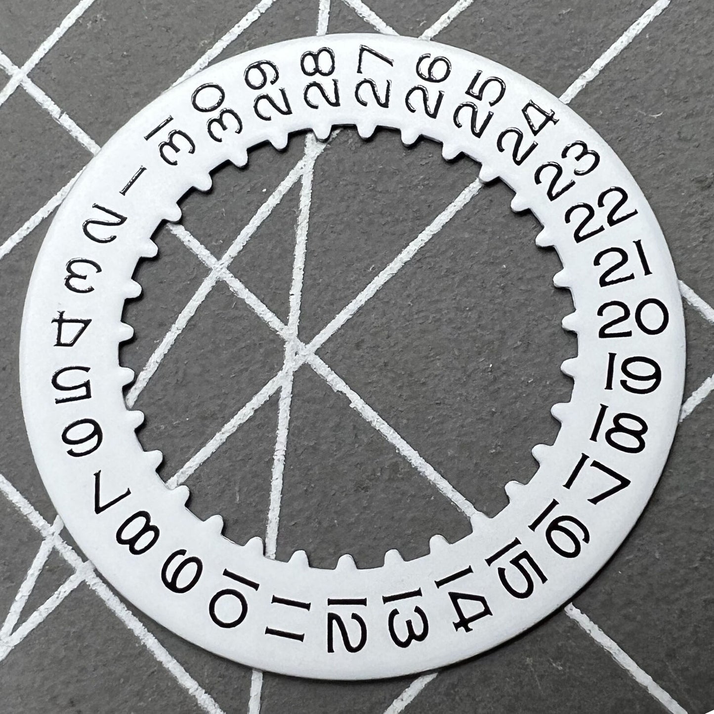 White date wheel for RLX 3135 watch movement, compatible replacement part for accurate date display.