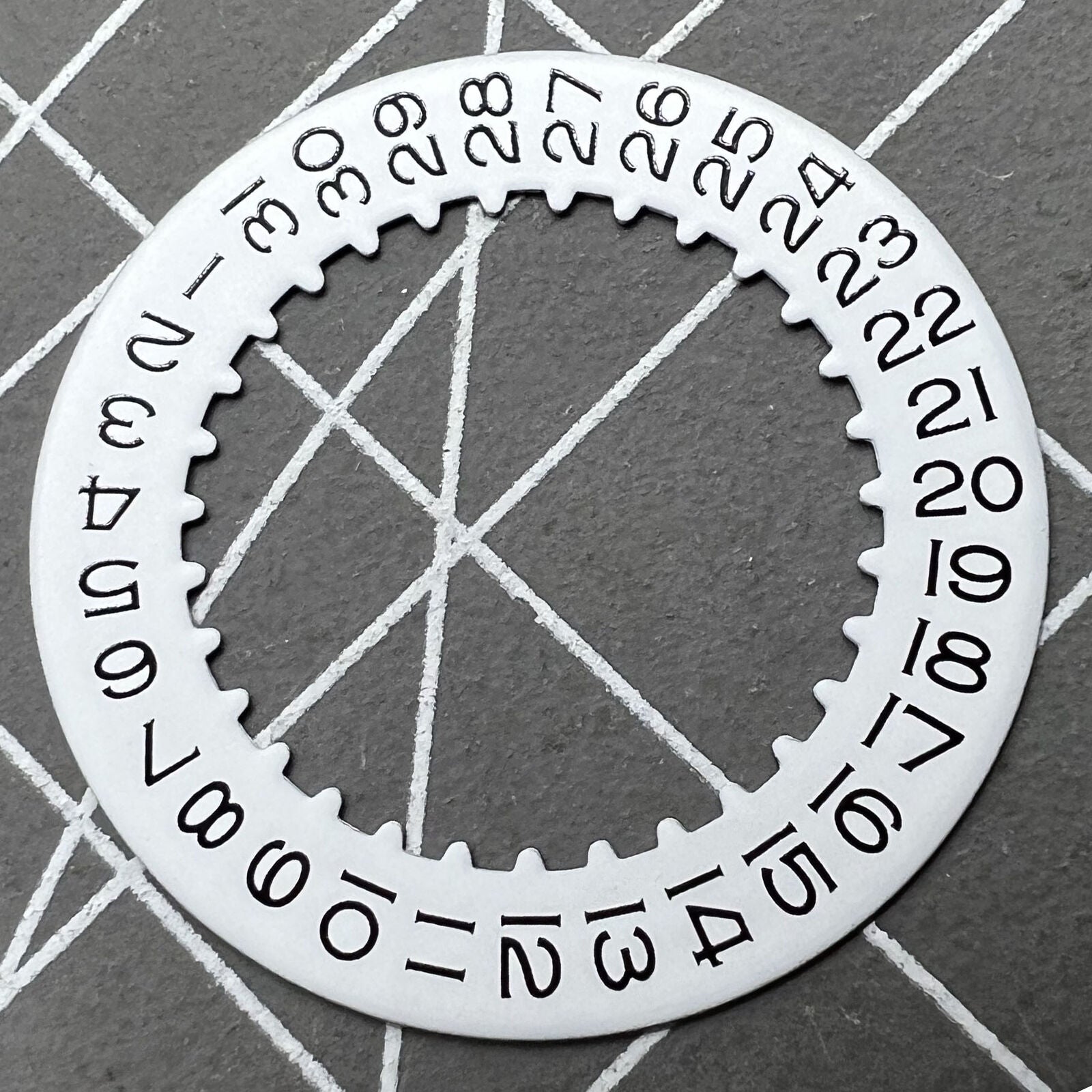 White date wheel for RLX 3135 watch movement, compatible replacement part for accurate date display.