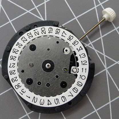 LD57 quartz watch repair part showing small second subdial at 6, 9, and 12 o'clock positions for precision timing.