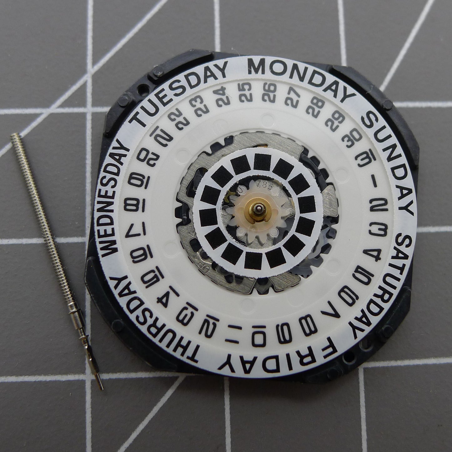 Japan Made Hattori Epson TMI VX44 VX44E white quartz watch dial with precise timekeeping for accessories.
