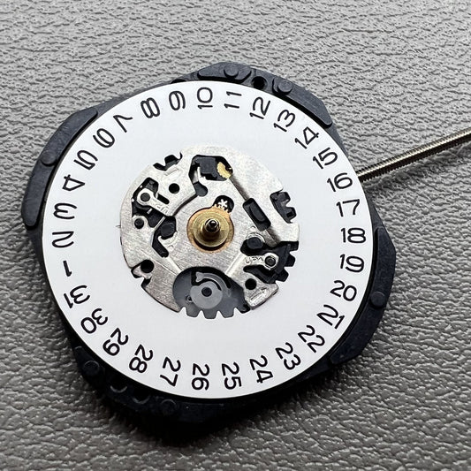 1. Japan Hattori Epson VX32 quartz watch movement with date at 3 o'clock, precise timekeeping.  