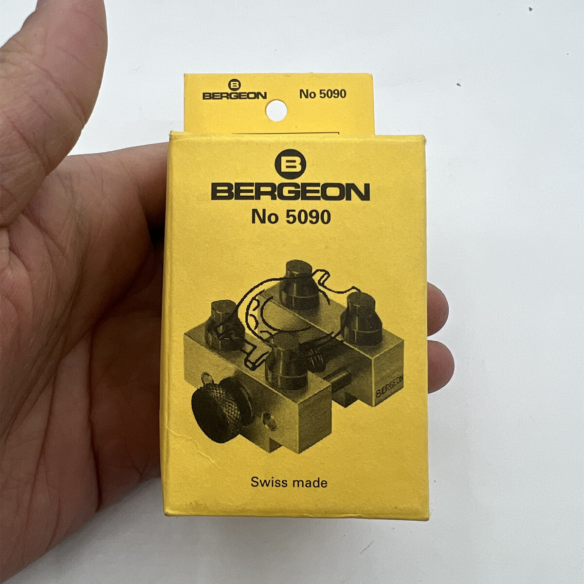Bergeon 5090 waterproof watch case holder securing watches during repairs and assembly.