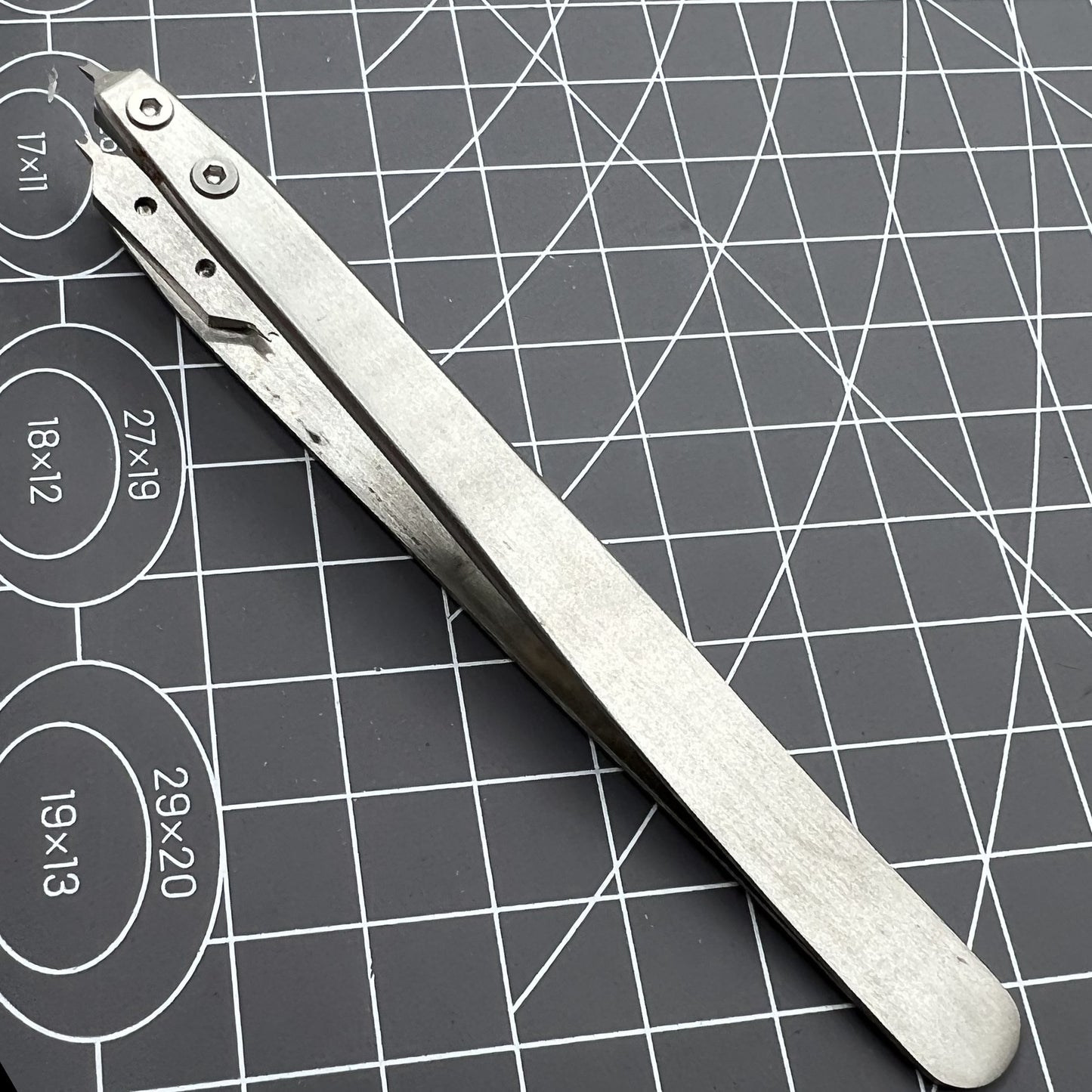 Precision Bergeon 7825 spring bar tweezer for watch strap fitting and lug removal tasks.