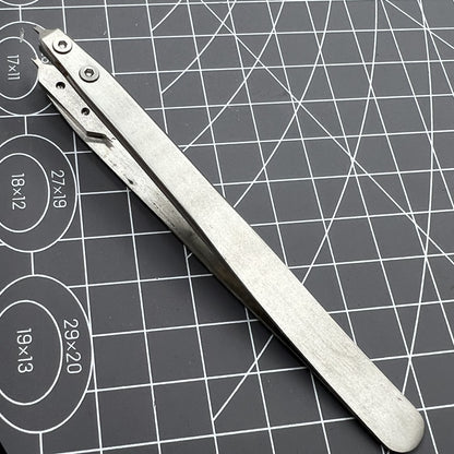 Precision Bergeon 7825 spring bar tweezer for watch strap fitting and lug removal tasks.