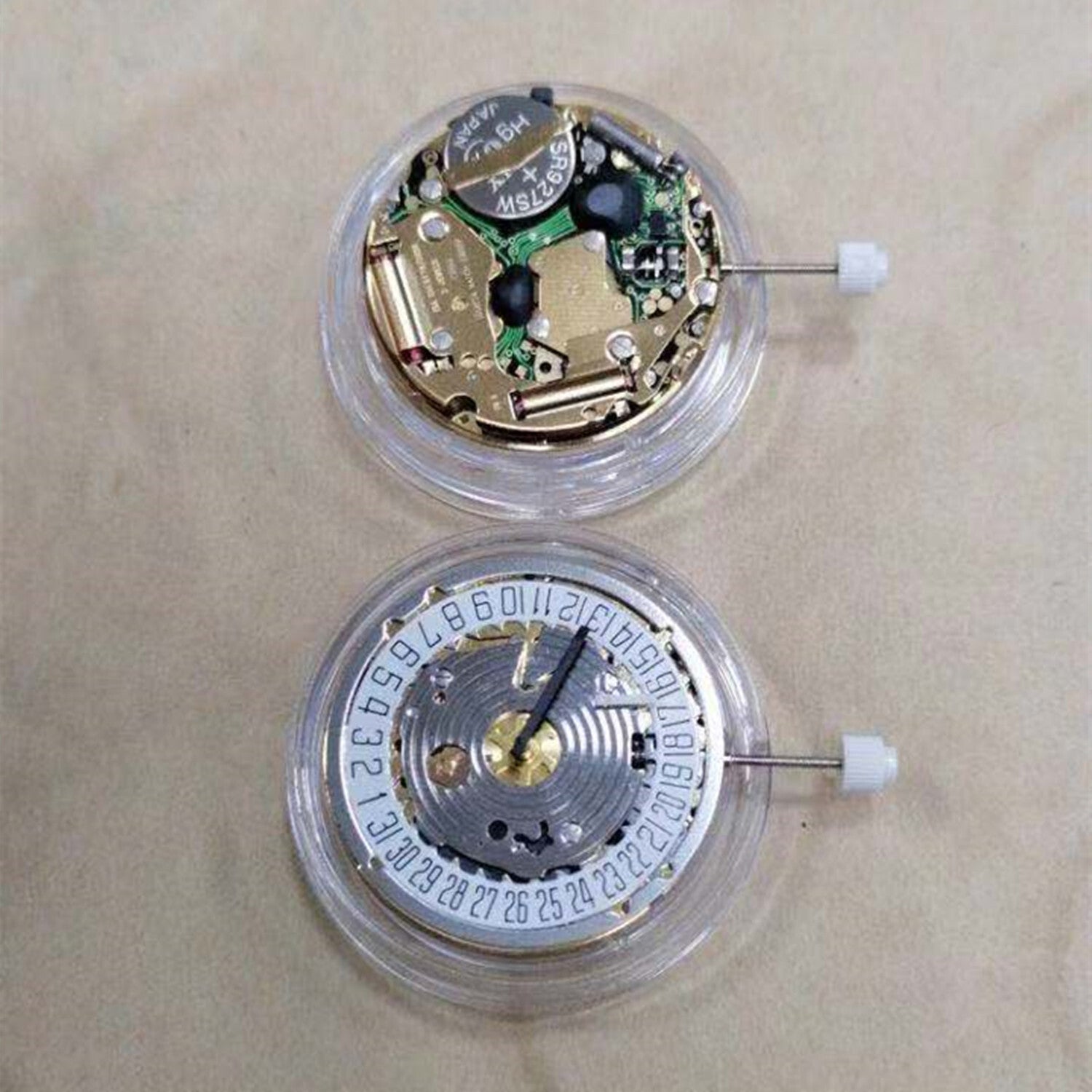 Watchmakers ISA 8176-2050 quartz movement with small seconds and date at 6 o'clock for watch repairs.
