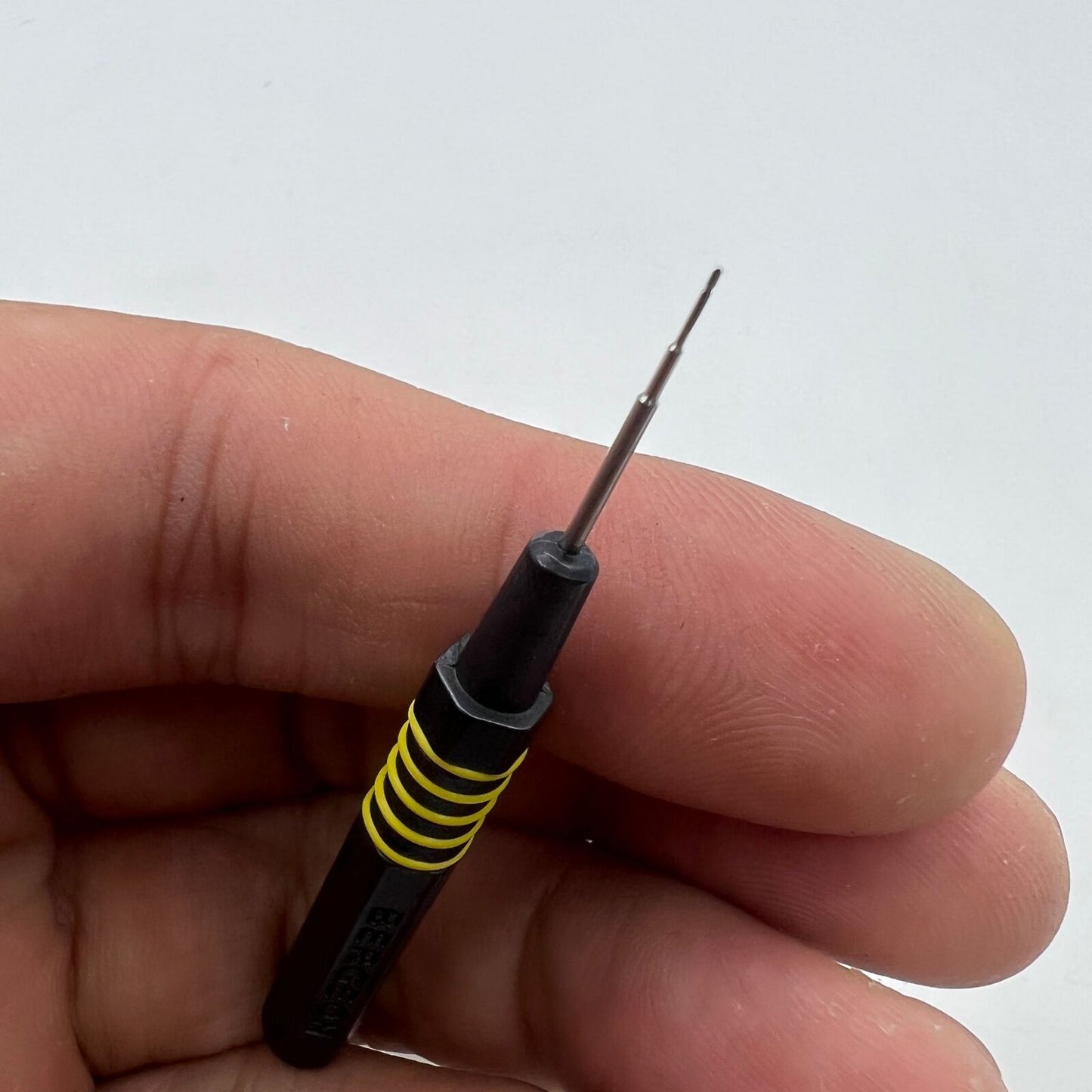 Bergeon 7013-R red metal dip oiler for precise watch grease application and maintenance tools.