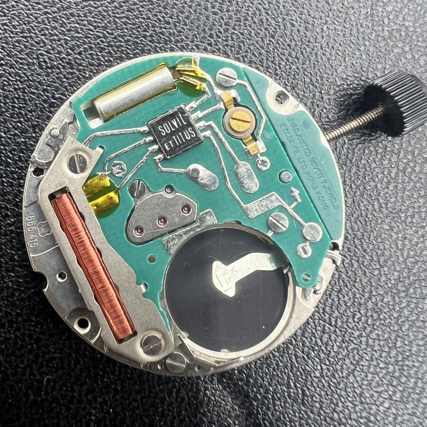 ETA 555.415 vintage quartz watch movement with 3 hands and date window at 3 o'clock, authentic replacement part.