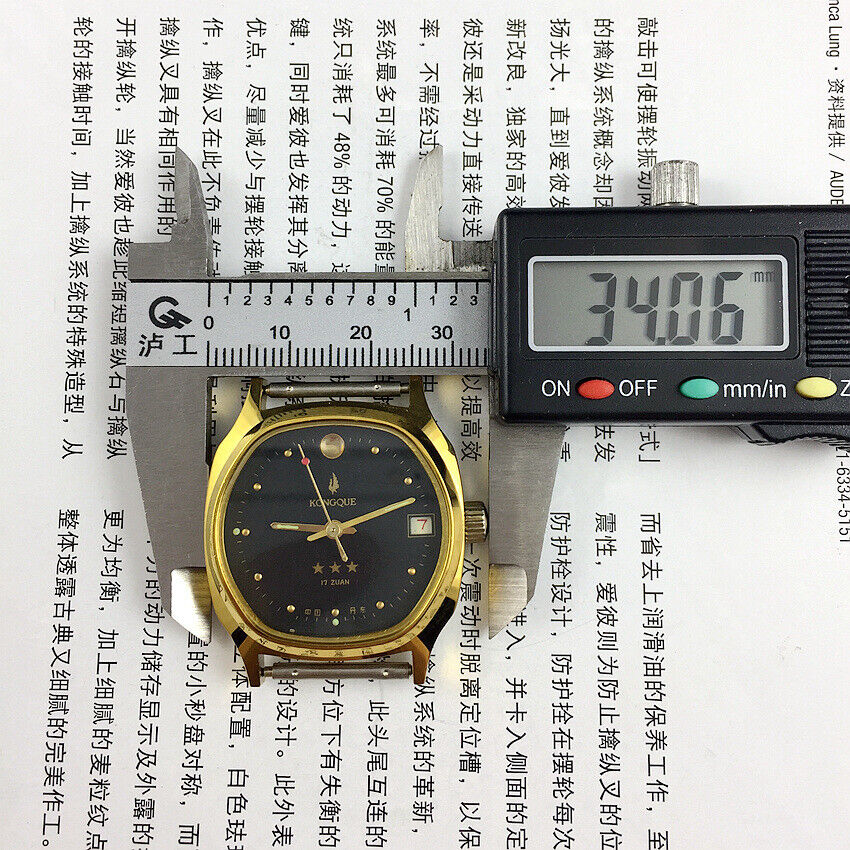 33mm Chunlan steel manual watch with silver dial, 17 jewels, and matching watch band.