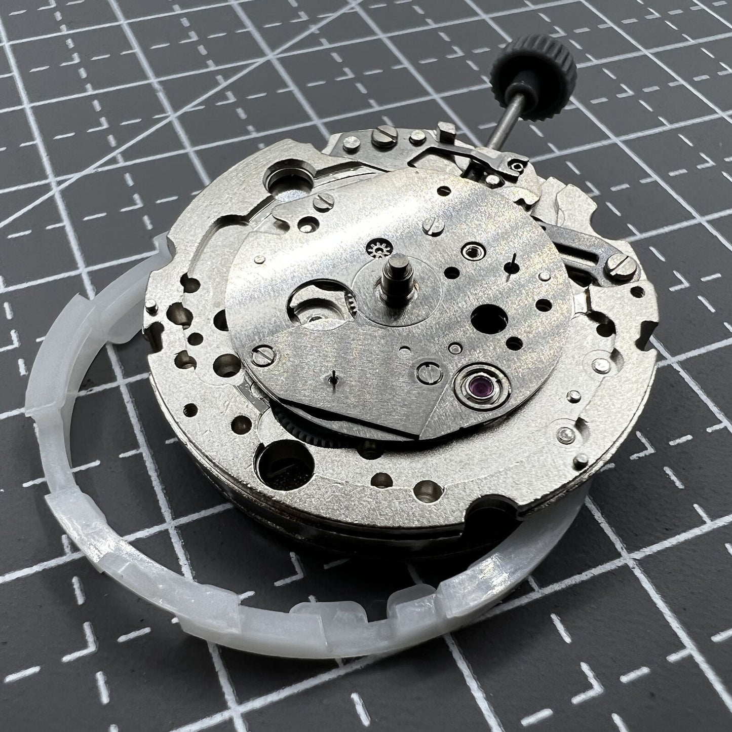 Miyota 8245 silver automatic mechanical movement by Citizen, precision-engineered in Japan for watch accessories.
