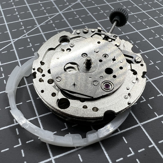 Miyota 8245 silver automatic mechanical movement by Citizen, precision-engineered in Japan for watch accessories.
