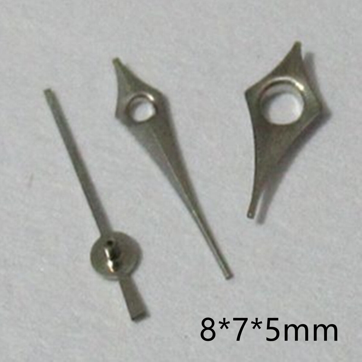 Silver 8mm pointed watch hands set for Miyota 2035-2315 movements, precision design.