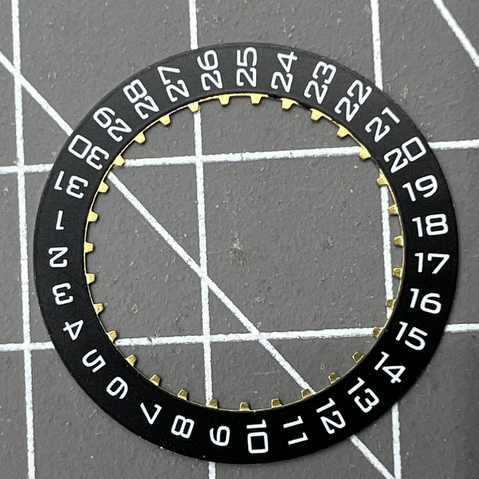 Black Date Disk Wheel displaying date at 3 o'clock for ETA2824 movements, Swiss Made precision components.