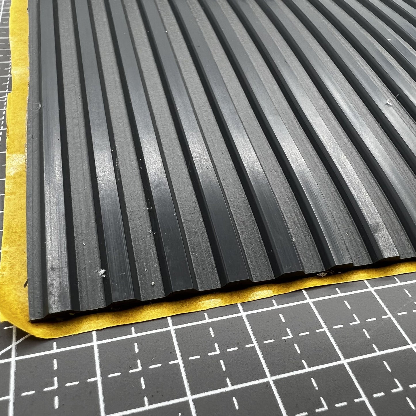 Swiss Bergeon 5965-D grooved self-adhesive bench mat for watch repair workspace protection and accessory organization