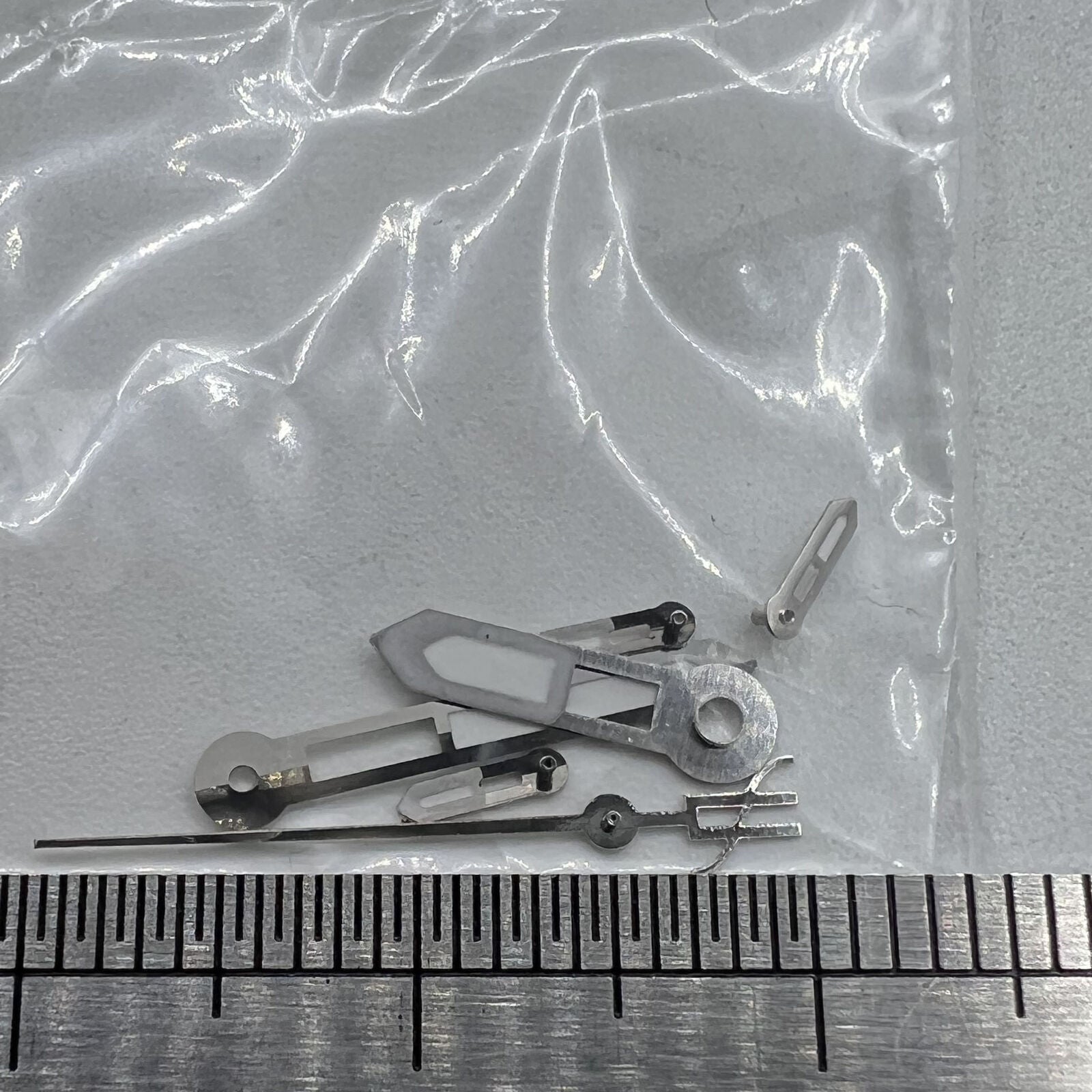 Silver-trimmed 15mm watch hands with green lume, compatible with Miyota OS10, OS20, OS22, OS60, OS80
