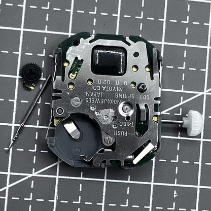 Japan Miyota T480 quartz watch mechanism showing 3 hands and date display for precise timekeeping.