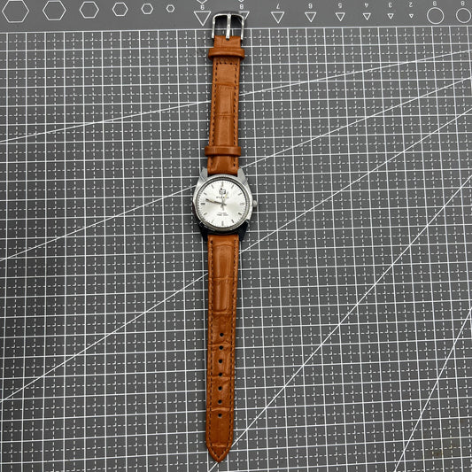 PUBU 32mm manual mechanical watch with grey dial and nail markers, 17 jewels, precision craftsmanship.