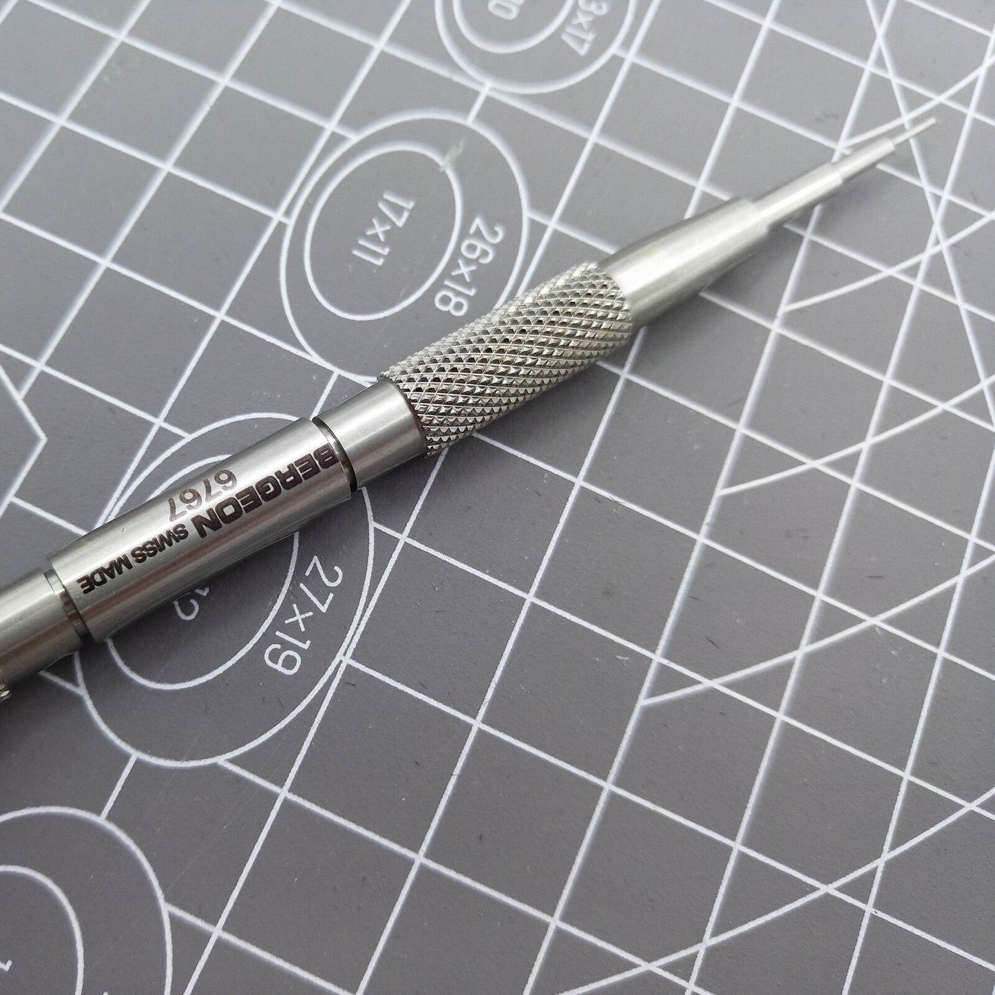 Bergeon 6767-F spring bar tool with ergonomic handle for precise Swiss watch bracelet adjustments.