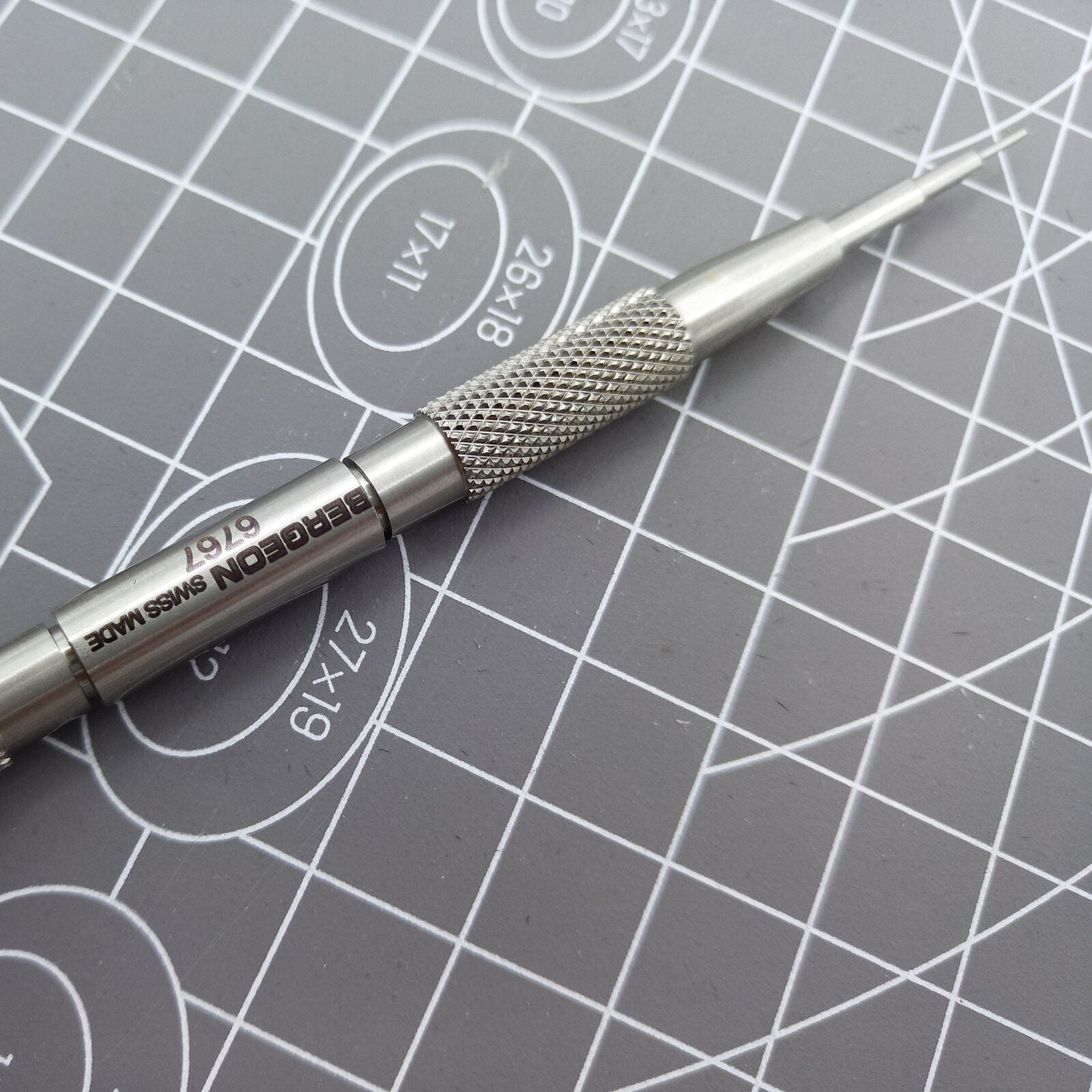 Bergeon 6767-F spring bar tool with ergonomic handle for precise Swiss watch bracelet adjustments.