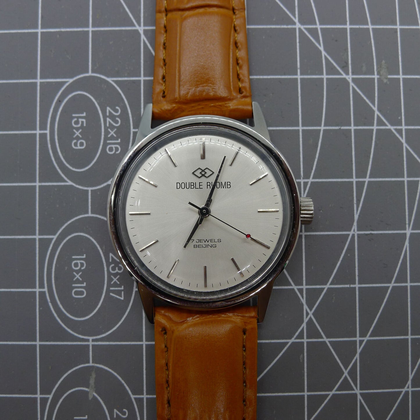 Beijing 36mm Double Rhomb watch with silver case and nail strap, manual mechanical movement for precise timekeeping