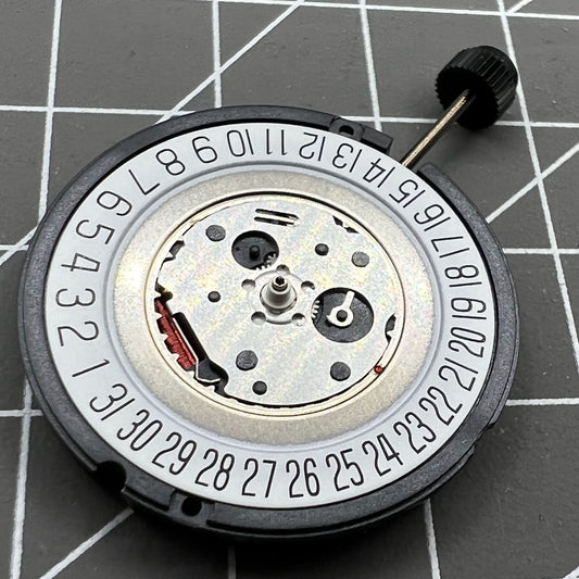 ETA 805.112 Swiss quartz watch movement with 3 hands and date at 6 o'clock, precision craftsmanship.