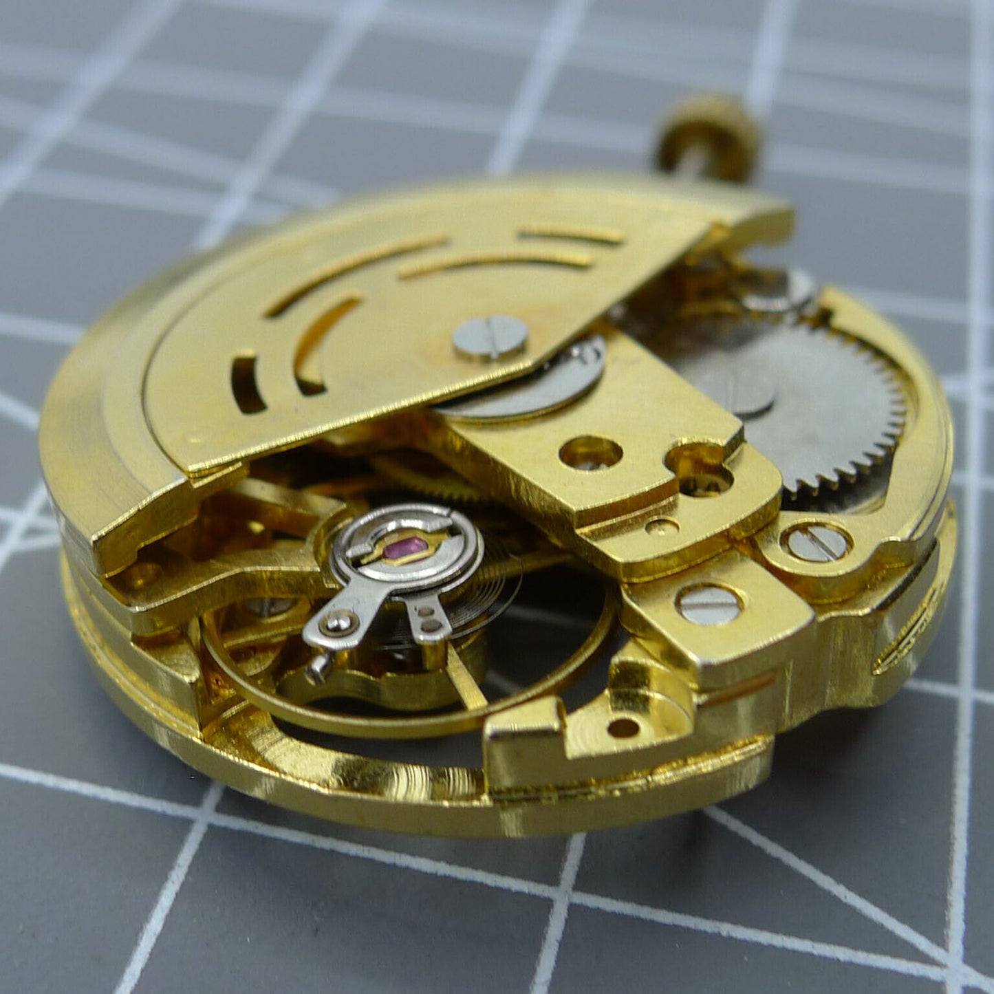 DANDONG 26.5mm 7120 automatic watch movement with hollow golden design for accurate timekeeping.