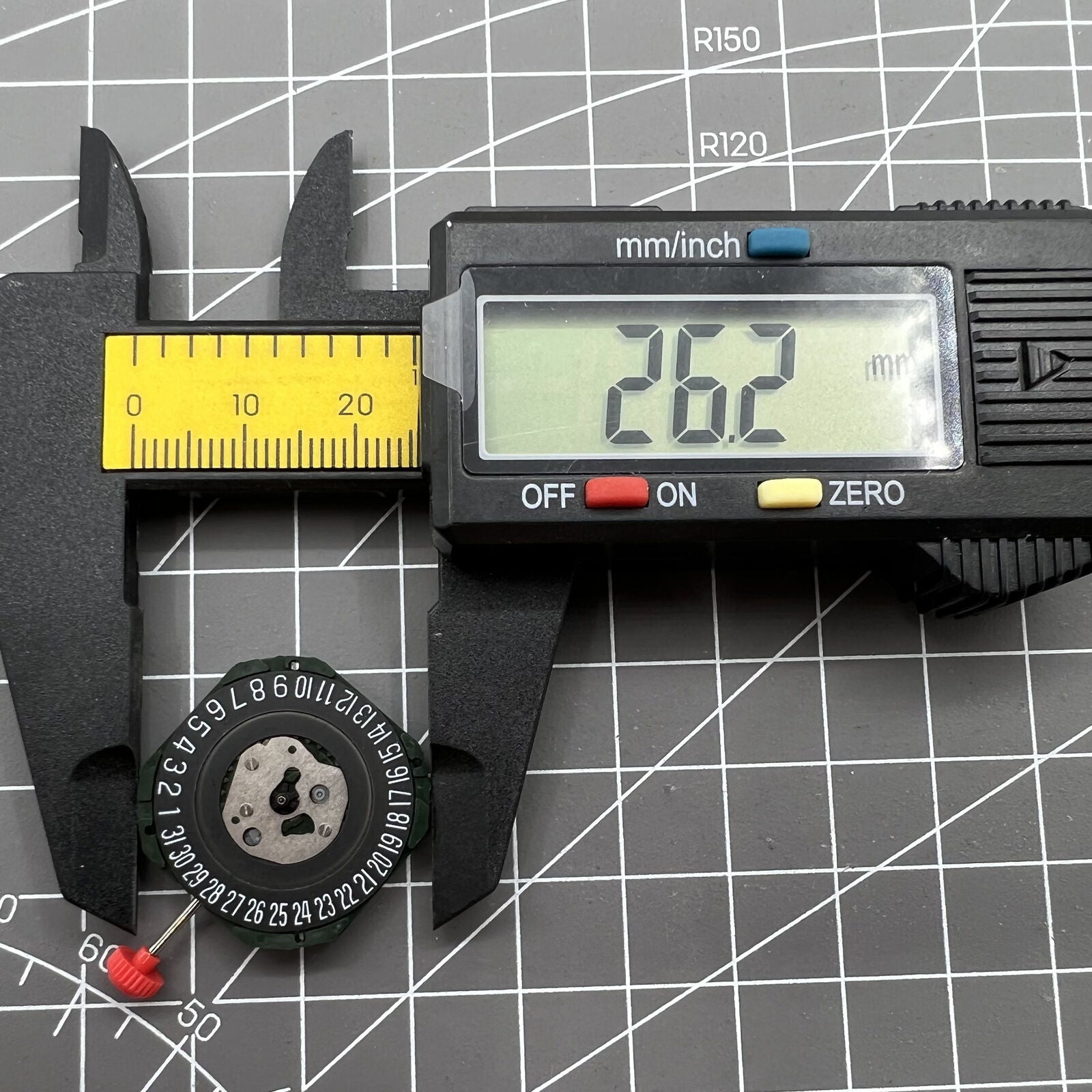 Black dial watch with Miyota 2315 quartz, 3 hands, date at 6, and watch stem detail.