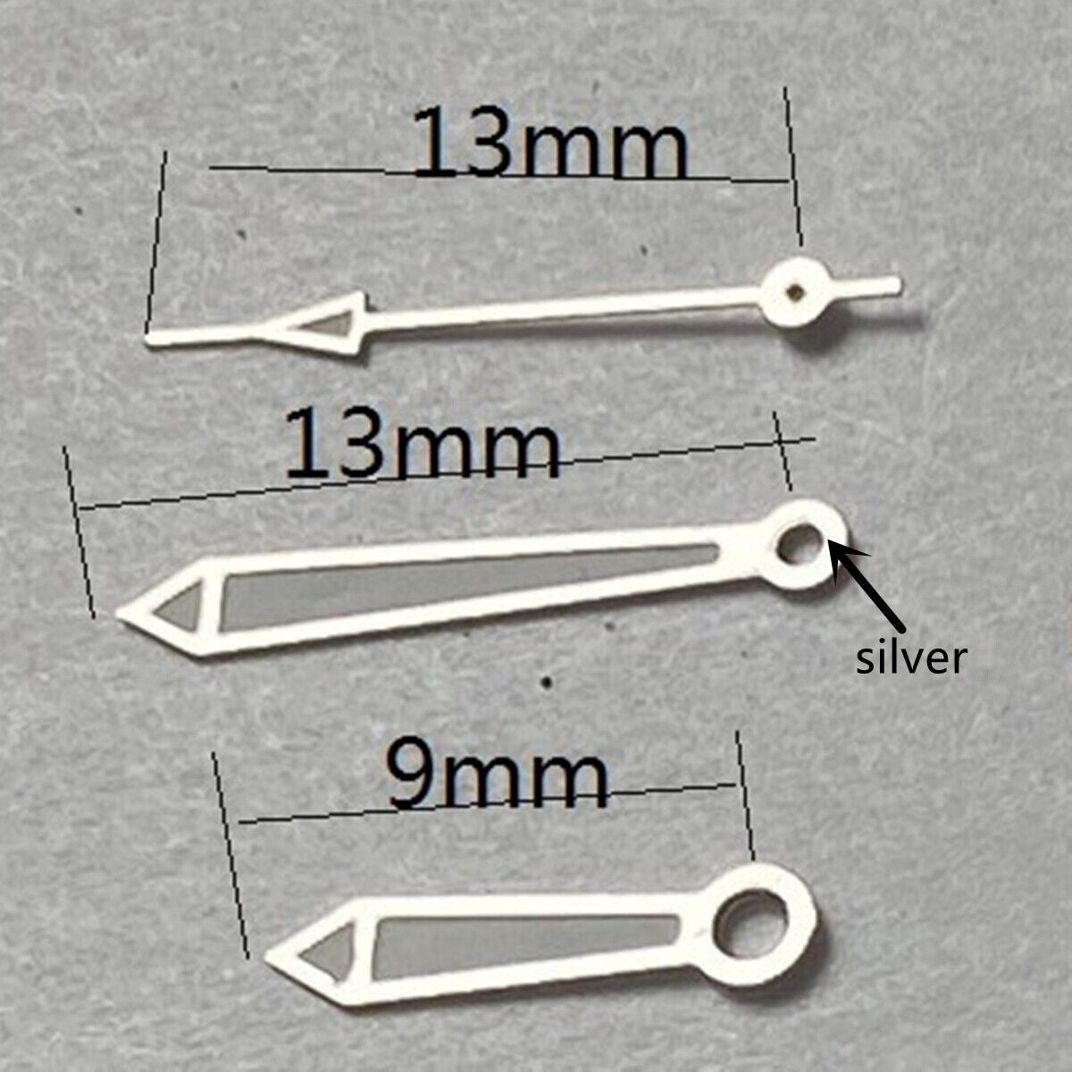 Green lume watch hands with silver trim, 13mm for Miyota 2315, 2035, 2036, 2115, and 2305 movements.