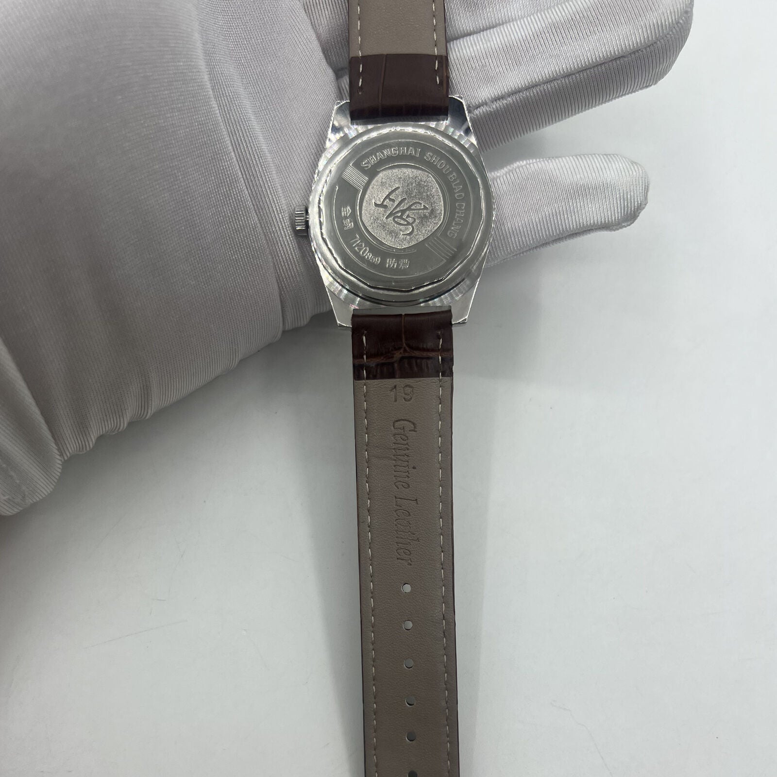 Shanghai Factory 38mm manual mechanical watch with white dial, 3 hands, 19 jewels, classic design.