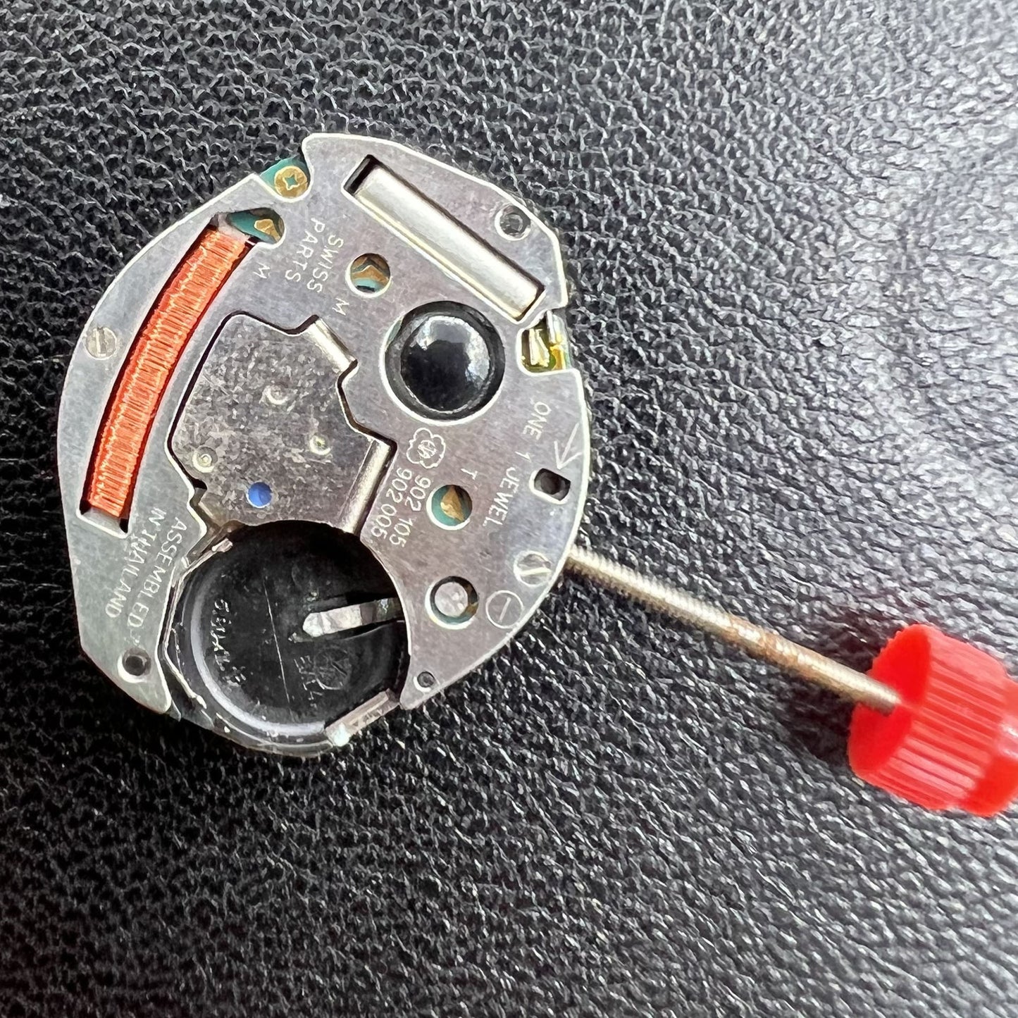 Swiss ETA 902.105 quartz watch movement for precise timekeeping in luxury watch accessories.