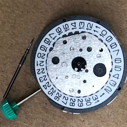 Miyota FS20 chronograph quartz watch movement with date at 3, precision Japanese craftsmanship.