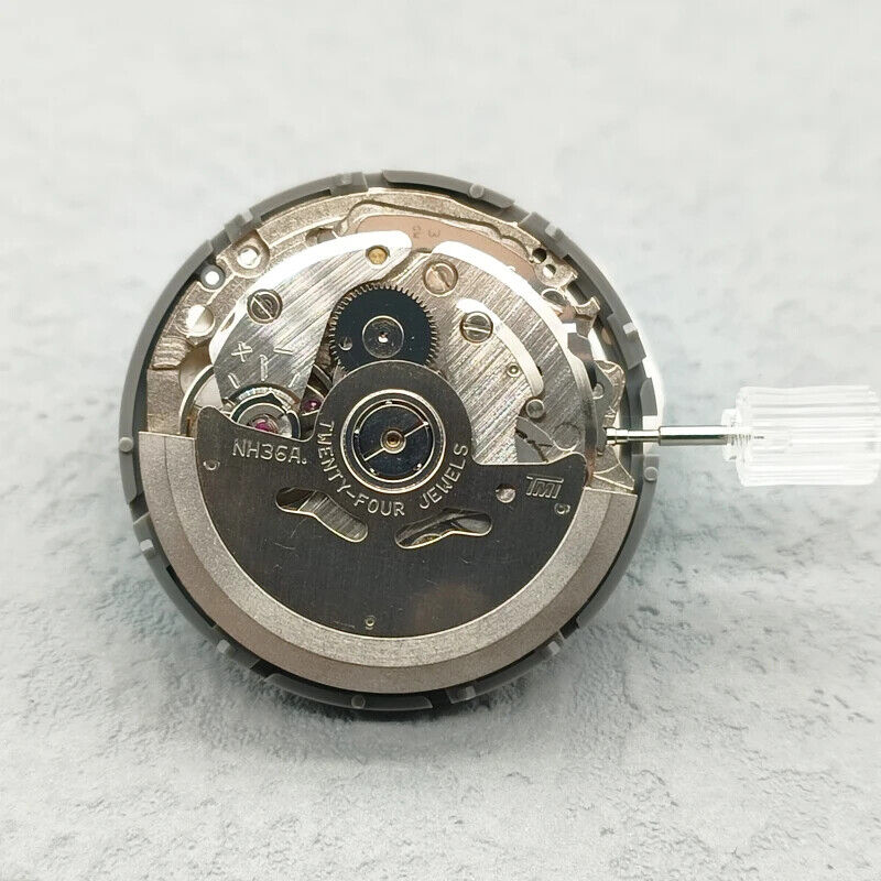 Japan Made NH36 automatic watch movement showcasing Arabic date dial and crown at 3 o'clock, durable precision by Seiko.