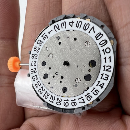 Miyota JS15 Japan quartz watch movement with small second at 6, 9, 12 and date display at 6.