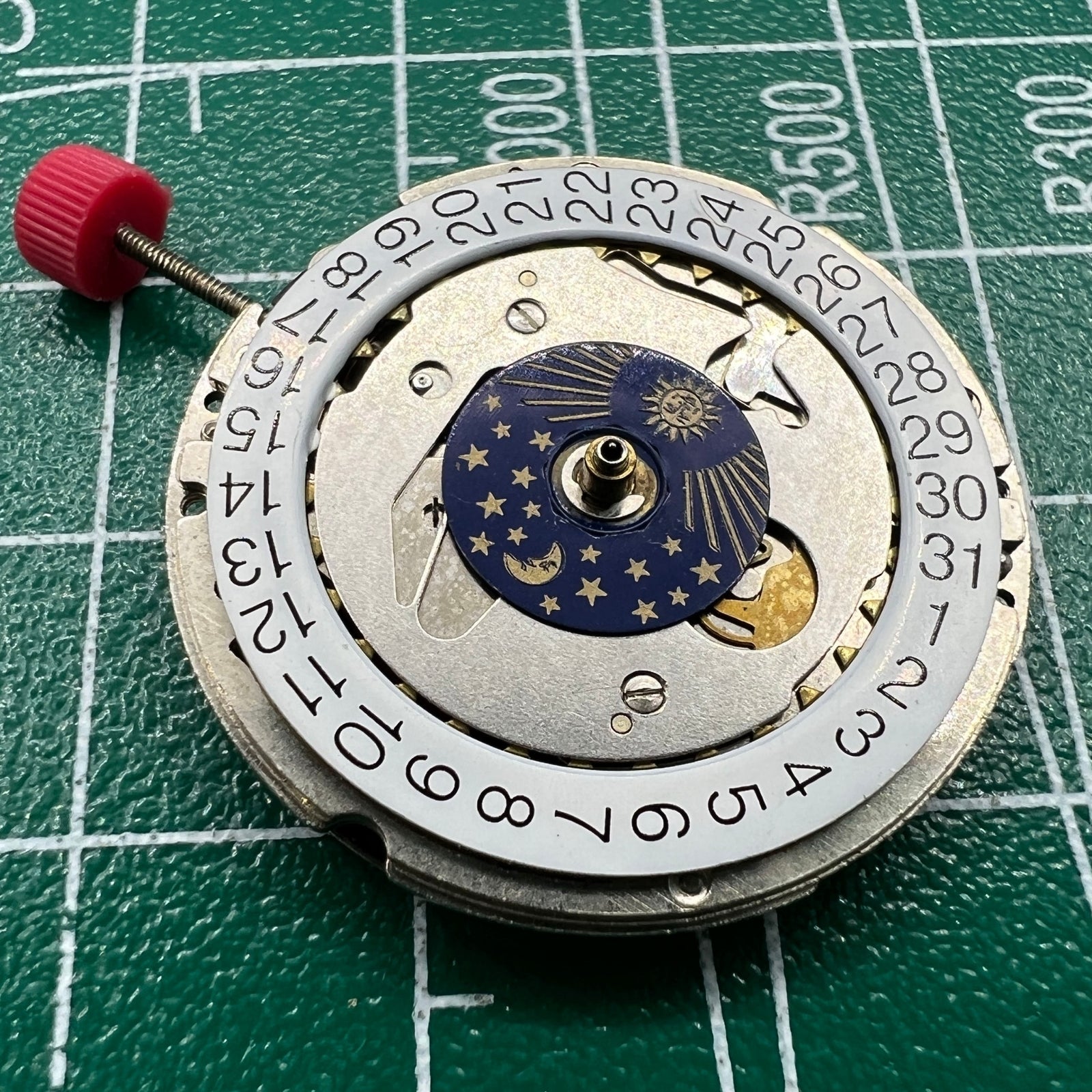 Wholesale ISA 1198 quartz watch movement by Swiss Made, featuring moon and star phase complication.