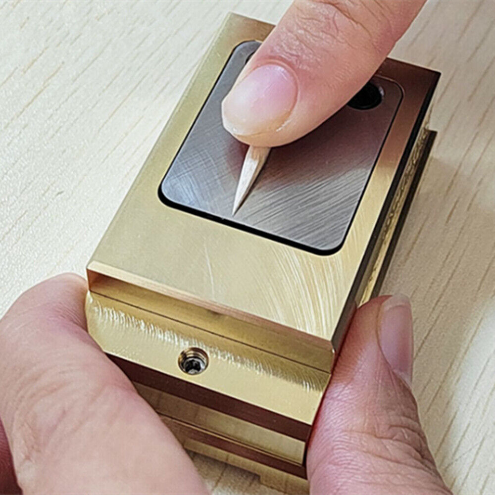 Brass-handled stainless steel pegwood tool by Woodcutter, ideal for precise watch cleaning and detailing.