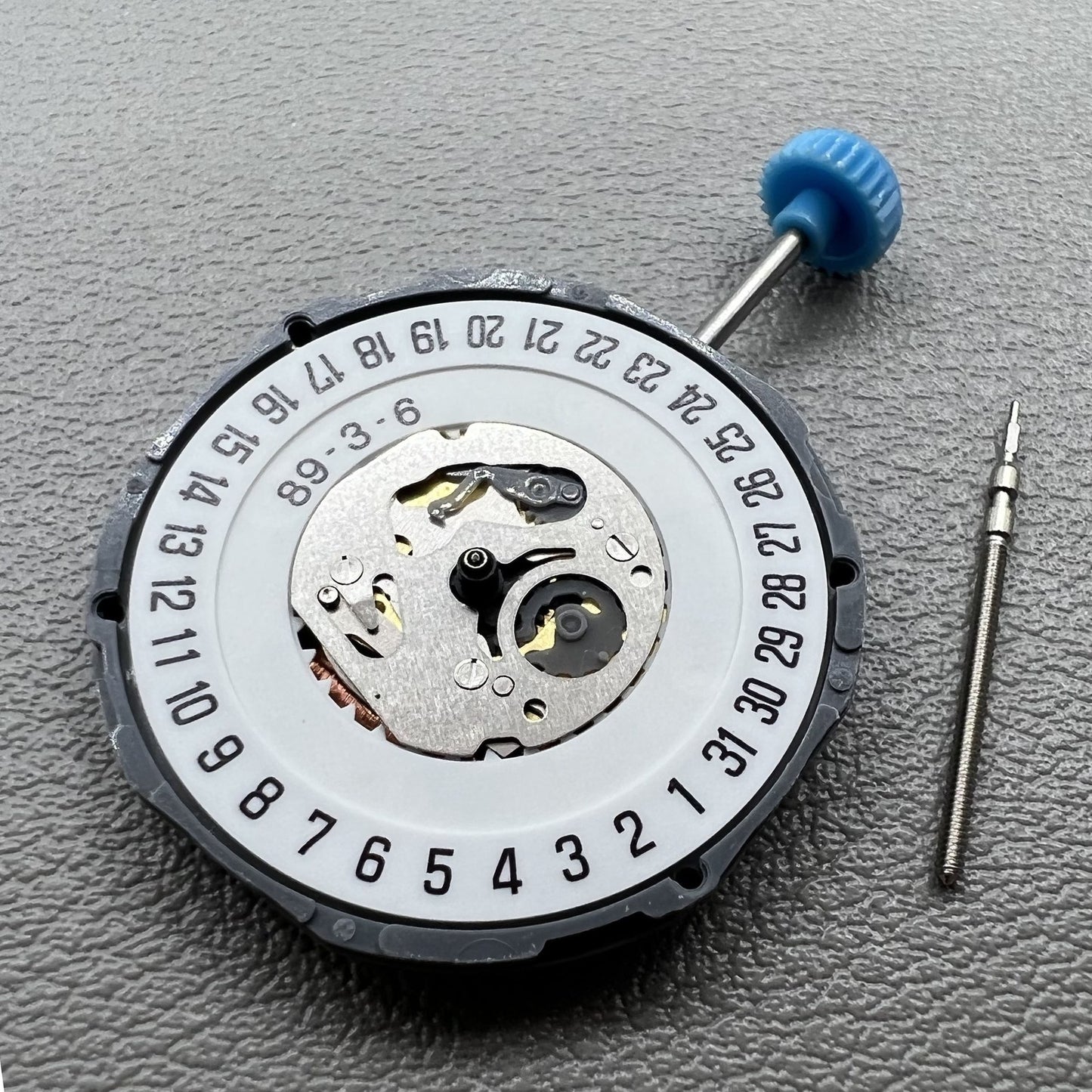 Miyota Japan 6M12 quartz movement watch with date at 6 o'clock and three hands, precise timing