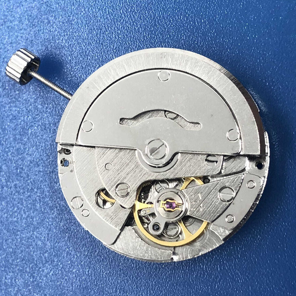 DG2813 automatic watch movement with silver dial, three hands, and calendar for accurate timekeeping.